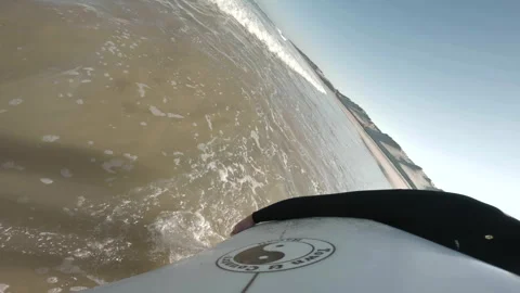Surfer walking water with board hand GoPro Stock Footage 342937243