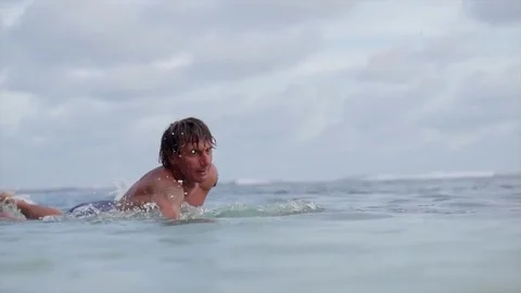 Surfer on a wave in Bali Video stock 71553784