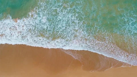 Surfer on a wave from far above 스톡 동영상 122281598