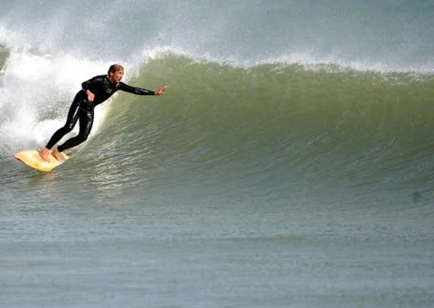 Surfer in wave Stock Photos