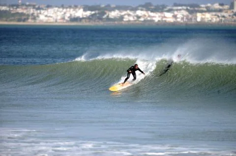 Surfer in wave Stock Photos
