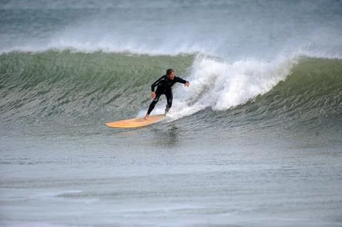 Surfer in wave Stock Photos