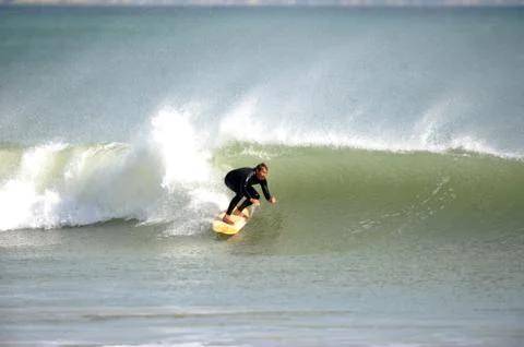 Surfer in wave Stock Photos