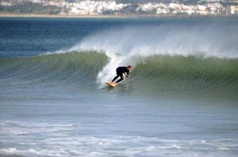 Surfer in wave Stock Photos