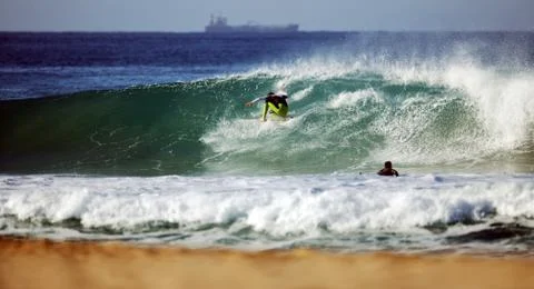 Surfer in wave Stock Photos