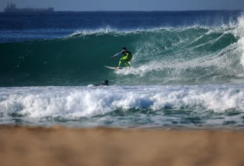 Surfer in wave Stock Photos