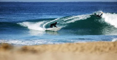Surfer in wave Stock Photos