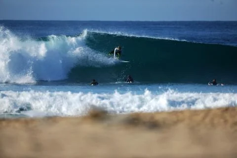 Surfer in wave Stock Photos