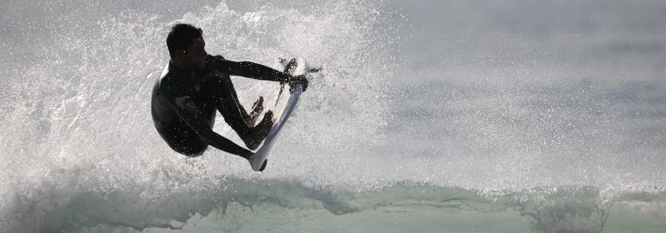 Surfer in wave Stock Photos
