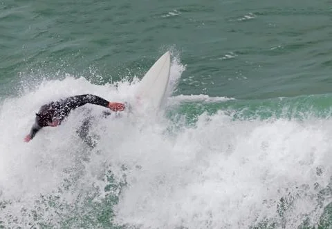 Surfer in the wave Stock Photos