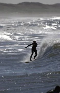 Surfer in the wave Stock Photos