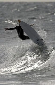 Surfer in the wave Stock Photos