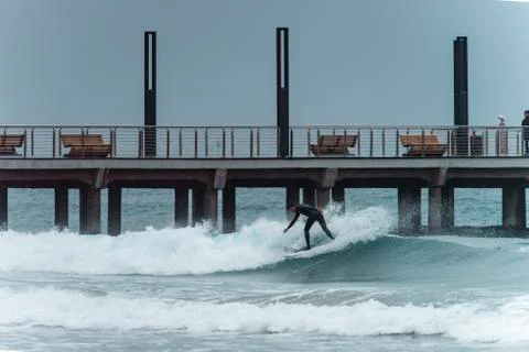 Surfer on a wave Stock Photos