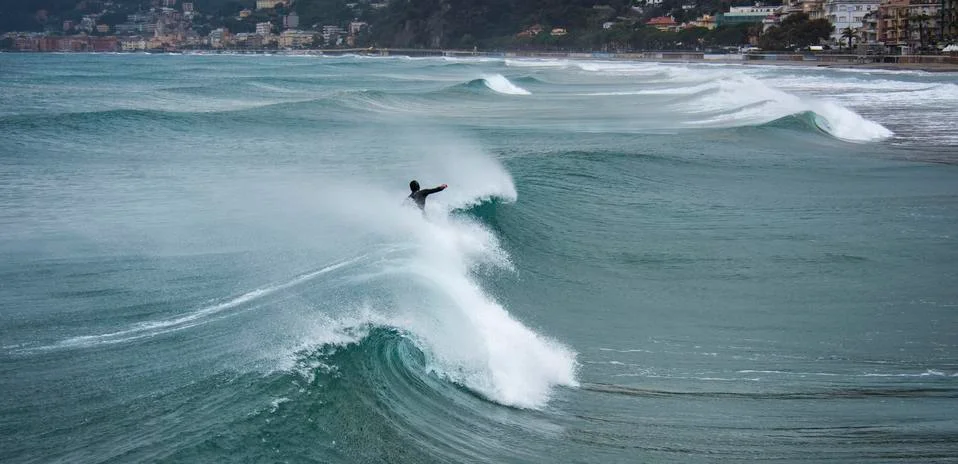 Surfer on a wave Stock Photos