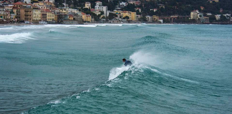 Surfer on a wave Stock Photos