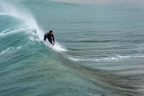 Surfer on a wave Stock Photos