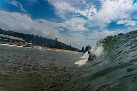 Surfer on a wave Stock Photos