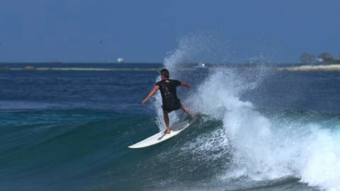 Surfer on wave at tropical climate Stock Footage 300425526