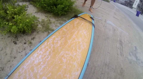 Surfer waxing board Video stock 42583818