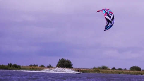 Surfer on a windy day on the lake Video stock 118573261