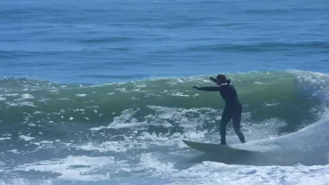 Surfer Wipes Out in Ocean Stock Footage 150979488