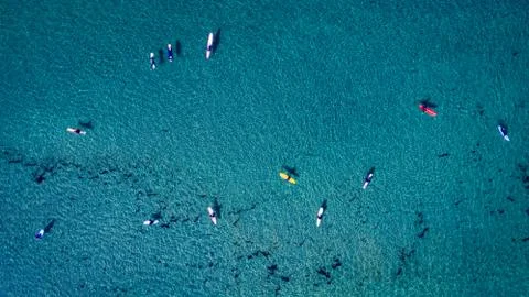 Surfers from above Stock Photos