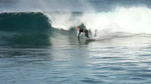 Surfers in action, riding the waves Stock Footage 18165029