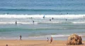 Surfers in action, riding the waves HD Footage