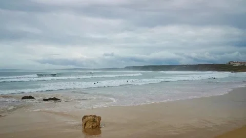 Surfers in agitated sea Stock Footage 144105911