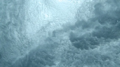 Surfers and rolling waves under the sea Video stock 108643844