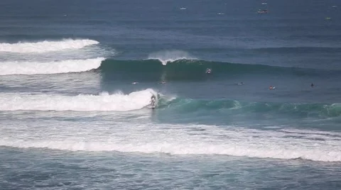 The surfers and waves, marine elements Beach, Uluwatu, Bali, Indonesia. Stock Footage 66579620