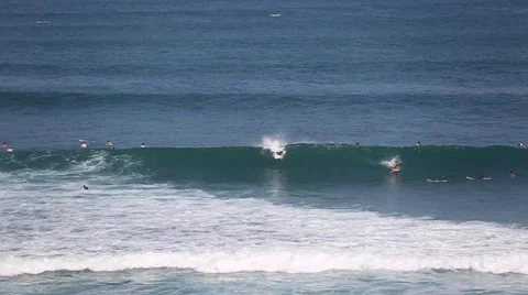 The surfers and waves, marine elements Beach, Uluwatu, Bali, Indonesia. Stock Footage 66579655