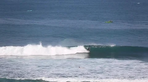 The surfers and waves, marine elements Beach, Uluwatu, Bali, Indonesia. Stock Footage 66579801