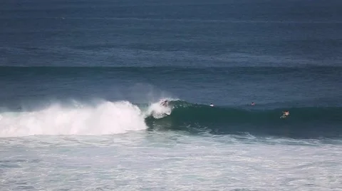 The surfers and waves, marine elements Beach, Uluwatu, Bali, Indonesia. Stock Footage 66579893