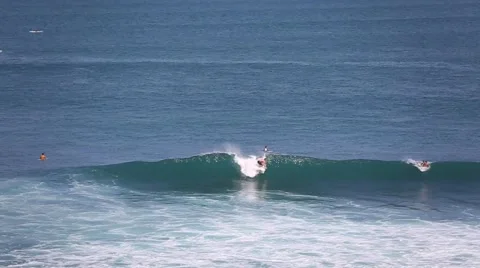 The surfers and waves, marine elements Beach, Uluwatu, Bali, Indonesia. Stock Footage 66579990