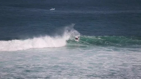 The surfers and waves, marine elements Beach, Uluwatu, Bali, Indonesia. Stock Footage 66580019
