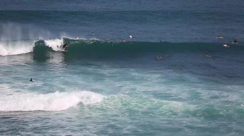 The surfers and waves, marine elements Beach, Uluwatu, Bali, Indonesia. Stock Footage 66580169