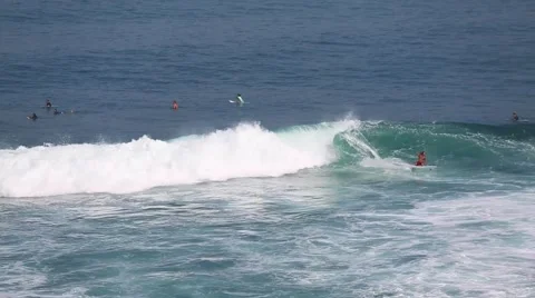 The surfers and waves, marine elements Beach, Uluwatu, Bali, Indonesia. Stock Footage 66588192