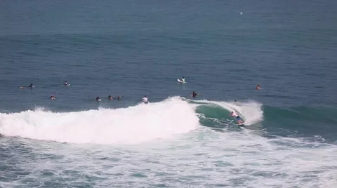 The surfers and waves, marine elements Beach, Uluwatu, Bali, Indonesia. Stock Footage 66590337