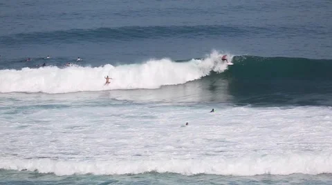 The surfers and waves, marine elements Beach, Uluwatu, Bali, Indonesia. Video stock 66590878