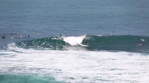 The surfers and waves, marine elements Beach, Uluwatu, Bali, Indonesia. Video stock 66594505