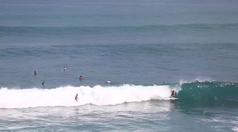 The surfers and waves, marine elements Beach, Uluwatu, Bali, Indonesia. Stock Footage 66605550