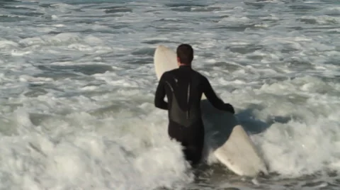 Surfers at the beach Stock Footage 46807433