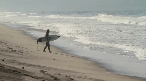 Surfers at the beach Stock Footage 46807448