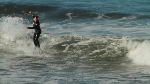 Surfers at the beach Stock Footage 46807509