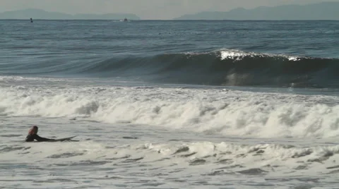 Surfers at the beach Stock Footage 46807674