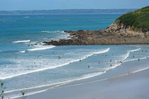 Surfers at the beach Stock-Fotos