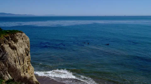Surfers Bobbing in Ocean Stock Footage 35209356