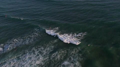 Surfers Catching Sunset Waves on Oahu, Hawaii Stock Footage 170903839
