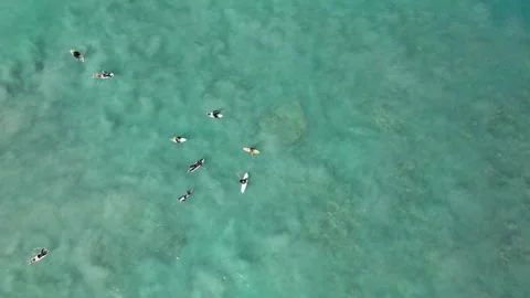 Surfers Catching Waves Breaking Over White Sand Cable Beach Broome WA Stock Footage 276427873